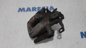 Used Rear brake calliper, left Peugeot 207 CC (WB) 1.6 16V Price € 19,90 Margin scheme offered by Maresia Parts