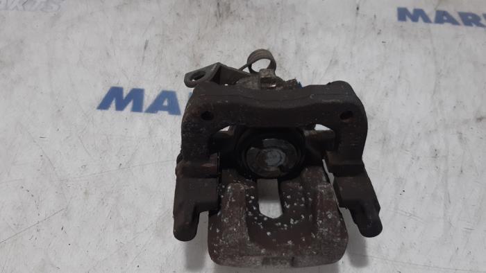 Rear brake calliper, left from a Peugeot 308 CC (4B) 1.6 16V THP 150 2010