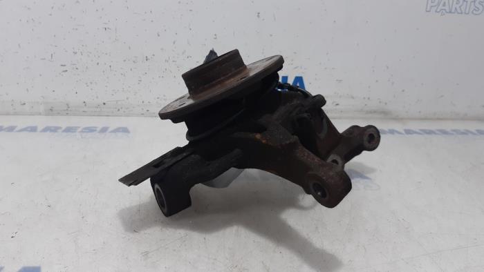 Knuckle, front left from a Renault Grand Scénic III (JZ) 1.4 16V TCe 130 2010