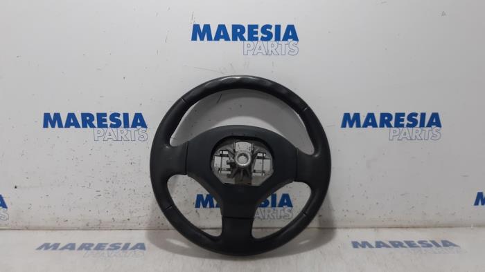 Steering wheel from a Peugeot 5008 I (0A/0E) 1.6 THP 16V 2012