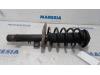 Front shock absorber rod, left from a Peugeot 207 CC (WB) 1.6 HDiF 16V 2014