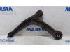 Front lower wishbone, left from a Fiat 500 (312) 0.9 TwinAir 85 2010