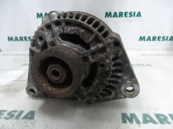 Begagnade Dynamo Alfa Romeo 145 (930A) 1.4 ie Pris € 40,00 Marginaltabell erbjuds av Maresia Parts