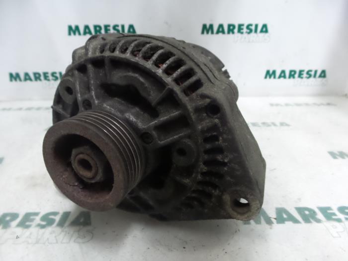 Begagnade Dynamo Alfa Romeo 145 (930A) 1.4 ie Pris € 40,00 Marginaltabell erbjuds av Maresia Parts