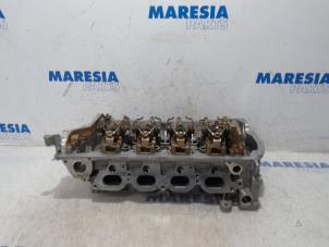 Overhauled Cylinder head Peugeot 308 SW (4E/H) 1.4 VTI 16V Price € 665,50 Inclusive VAT offered by Maresia Parts