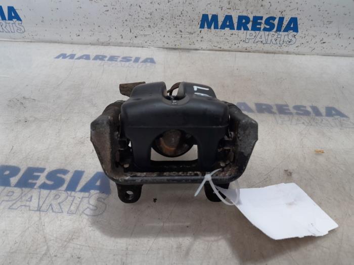 Rear brake callipers, left with part number 735322479 stock