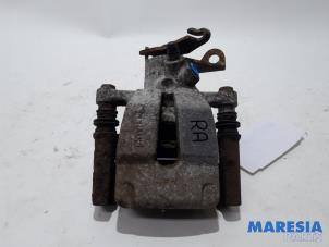 Used Rear brake calliper, right Renault Wind (EN/E4) 1.2 16V GT TCE eco2 Price € 40,00 Margin scheme offered by Maresia Parts
