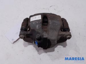 Used Front brake calliper, left Peugeot 2008 (CU) 1.6 HDiF 16V Price € 25,00 Margin scheme offered by Maresia Parts