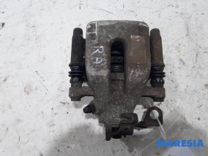 Used Rear brake calliper, right Peugeot 208 I (CA/CC/CK/CL) 1.6 16V THP 155 Price € 19,90 Margin scheme offered by Maresia Parts