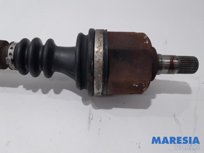 Front drive shaft, left from a Renault Espace (JK) 2.0 16V Turbo 2006