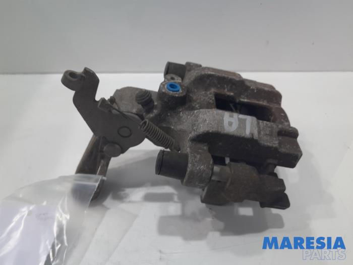 Rear brake calliper, left from a Peugeot 308 SW (L4/L9/LC/LJ/LR) 1.6 BlueHDi 120 2015
