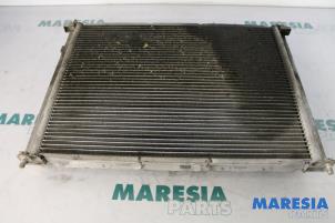 Used Radiator Renault Clio III (BR/CR) 1.4 16V Price € 75,00 Margin scheme offered by Maresia Parts