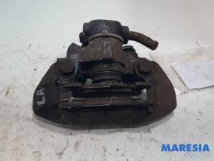 Used Rear brake calliper, left Peugeot 206 CC (2D) 1.6 16V Price € 24,95 Margin scheme offered by Maresia Parts