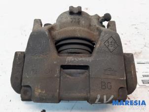 Used Front brake calliper, left Renault Scénic III (JZ) 1.5 dCi 110 Price € 25,00 Margin scheme offered by Maresia Parts