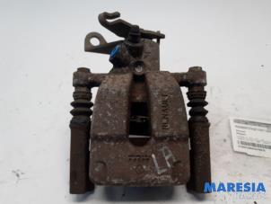 Used Rear brake calliper, left Renault Megane III Coupe (DZ) 2.0 16V TCe 180 Price € 35,00 Margin scheme offered by Maresia Parts