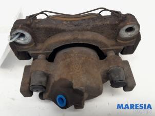 Used Front brake calliper, right Renault Scénic III (JZ) 1.4 16V TCe 130 Price € 25,00 Margin scheme offered by Maresia Parts