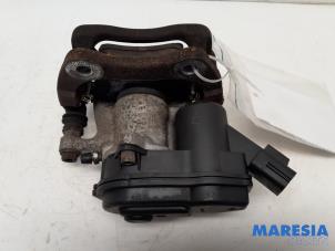 Used Rear brake calliper, left Renault Scénic III (JZ) 1.4 16V TCe 130 Price € 85,00 Margin scheme offered by Maresia Parts