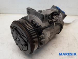 Usagé Compresseur de clim Renault Scénic III (JZ) 2.0 16V CVT Prix € 300,00 Règlement à la marge proposé par Maresia Parts