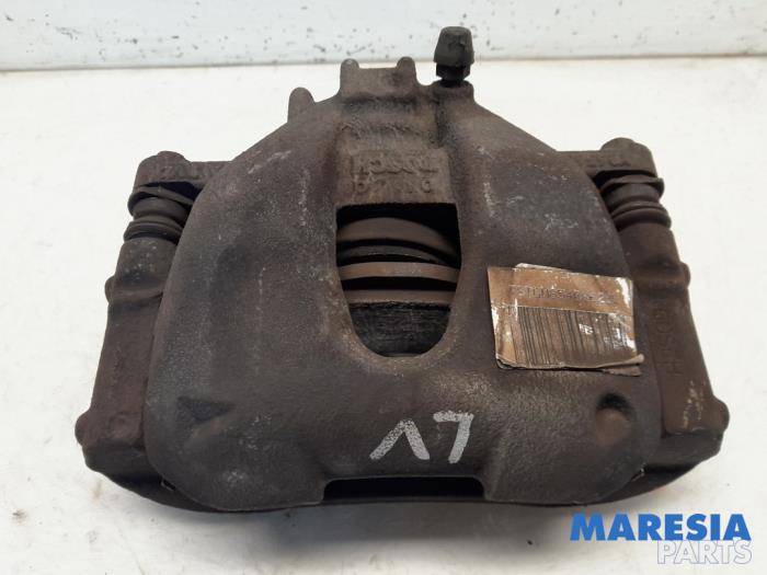 Brake caliper carrier