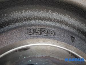 Flywheel from a Opel Corsa F (UB/UH/UP) 1.2 12V 75 2022