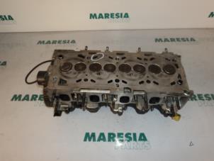 Used Cylinder head Fiat Punto II (188) 1.9 JTD 80 ELX 3-Drs. Price € 141,75 Margin scheme offered by Maresia Parts