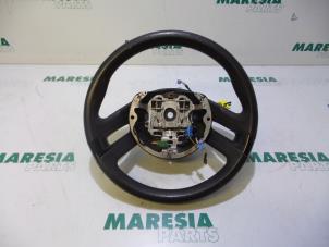 Usagé Volant Citroen C4 Grand Picasso (UA) 2.0 HDiF 16V 135 Prix € 50,00 Règlement à la marge proposé par Maresia Parts