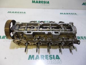 Używane Glowica cylindra Peugeot 206 SW (2E/K) 1.4 HDi Cena € 210,00 Procedura marży oferowane przez Maresia Parts