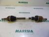 Front drive shaft, left from a Renault Scénic II (JM) 1.5 dCi 105 FAP 2008
