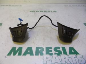 Used Steering wheel mounted radio control Peugeot 208 I (CA/CC/CK/CL) 1.2 Vti 12V PureTech 82 Price € 85,00 Margin scheme offered by Maresia Parts