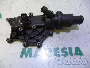 Used Thermostat housing Renault Clio III (BR/CR) 1.4 16V Price € 25,00 Margin scheme offered by Maresia Parts