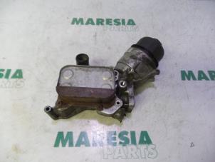 Usados Soporte de filtro de aceite Fiat Punto Evo (199) 1.3 JTD Multijet 85 16V Euro 5 Precio € 65,00 Norma de margen ofrecido por Maresia Parts