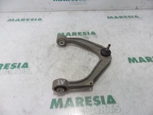 Used Front upper wishbone, left Alfa Romeo 159 (939AX) 1.9 JTDm Price € 35,00 Margin scheme offered by Maresia Parts