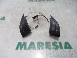 Used Steering wheel mounted radio control Fiat Doblo Cargo (263) 1.3 MJ 16V DPF Euro 5 Price € 35,00 Margin scheme offered by Maresia Parts