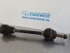 Front drive shaft, left from a Seat Ibiza II (6K1) 1.4 16V 2002