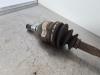 Front drive shaft, left from a Toyota Yaris Verso (P2) 1.3 16V 2000