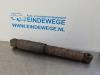 Rear shock absorber, left from a Opel Astra H GTC (L08) 1.4 16V Twinport 2008
