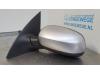 Wing mirror, left from a Opel Corsa C (F08/68) 1.2 16V Twin Port 2006