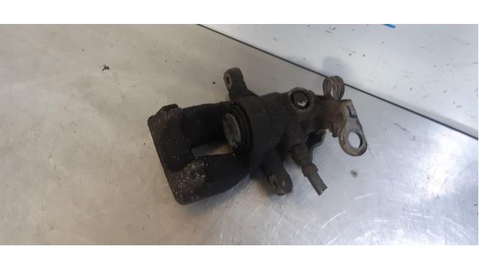 Rear brake calliper, left from a Fiat Stilo (192A/B) 1.6 16V 3-Drs. 2004