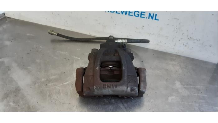 Front brake calliper, left from a MINI Mini One/Cooper (R50) 1.6 16V Cooper 2005
