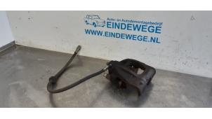 Used Front brake calliper, right BMW Mini One/Cooper (R50) 1.6 16V Cooper Price € 30,00 Margin scheme offered by Auto- en demontagebedrijf Eindewege