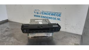 Used Radio CD player BMW X5 (E70) xDrive 35d 3.0 24V Price on request offered by Auto- en demontagebedrijf Eindewege