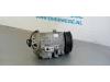 Air conditioning pump from a Seat Ibiza IV SC (6J1) 1.4 16V 2009