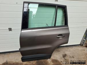 Used Rear door 4-door, left Volkswagen Tiguan (5N1/2) 1.4 TSI 16V Price € 230,00 Margin scheme offered by Auto- en demontagebedrijf Eindewege