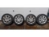 Set of wheels + tyres from a Opel Corsa D, 2006 / 2014 1.2 16V, Hatchback, Petrol, 1.229cc, 59kW (80pk), FWD, Z12XEP; EURO4, 2006-07 / 2014-08 2007