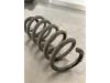 Rear coil spring from a Renault Clio IV (5R) 0.9 Energy TCE 90 12V 2014