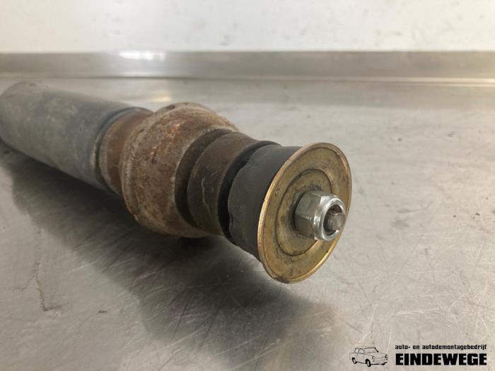 Rear shock absorber, left from a Volkswagen Lupo (6X1) 1.2 TDI 3L 2001