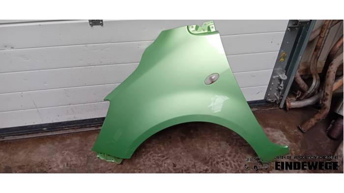 Front wing, left from a Opel Agila (B) 1.2 16V 2009
