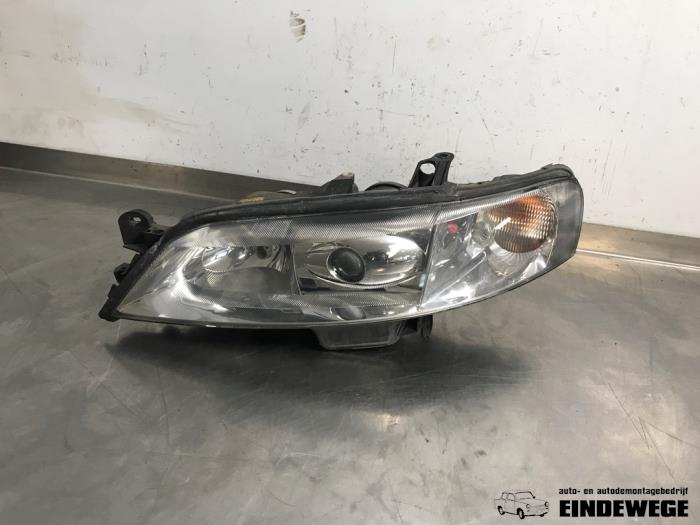 Używane Reflektor lewy Opel Vectra B Caravan (31) 1.6 16V Cena € 35,00 Procedura marży oferowane przez Auto- en demontagebedrijf Eindewege