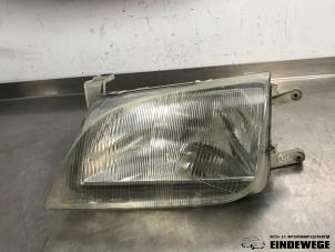 Używane Reflektor lewy Suzuki Swift (SF310/413) 1.3 Cena € 25,00 Procedura marży oferowane przez Auto- en demontagebedrijf Eindewege