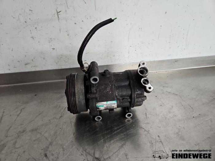 Usagé Compresseur de clim Dacia Sandero I (BS) 1.2 16V Prix € 40,00 Règlement à la marge proposé par Auto- en demontagebedrijf Eindewege